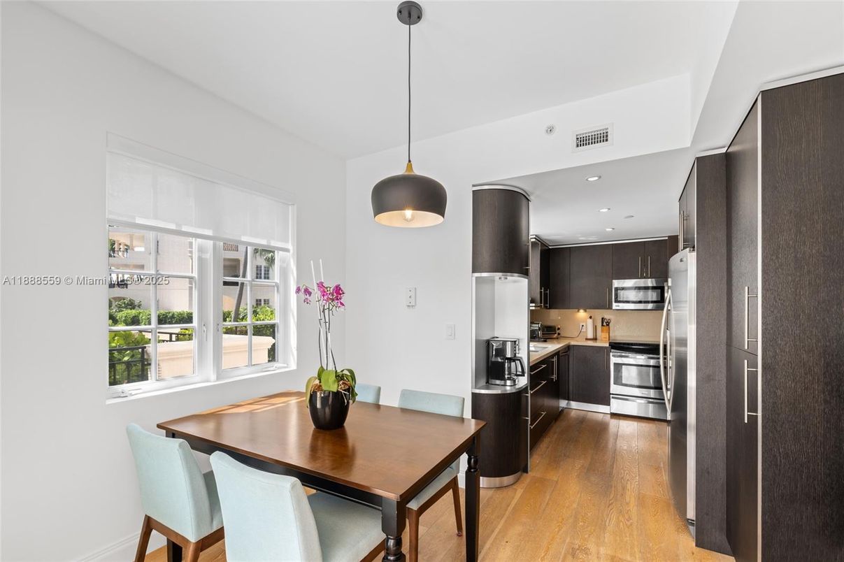 Dining room, Interior, Kitchen, Pendant Lights, Recessed Lighting, Stainless Steel Appliances, Wood Texture Flooring