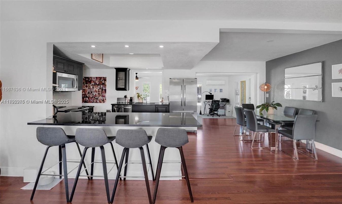Dining room, Interior, Kitchen, Living room, Recessed Lighting, Stainless Steel Appliances, Wood Texture Flooring