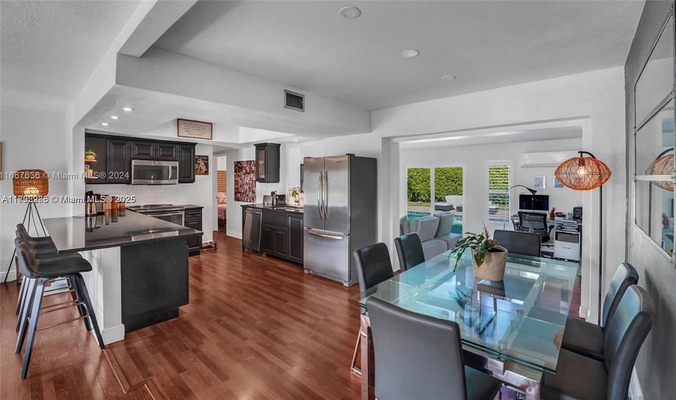 Dining room, Interior, Kitchen, Recessed Lighting, Stainless Steel Appliances, Wood Texture Flooring