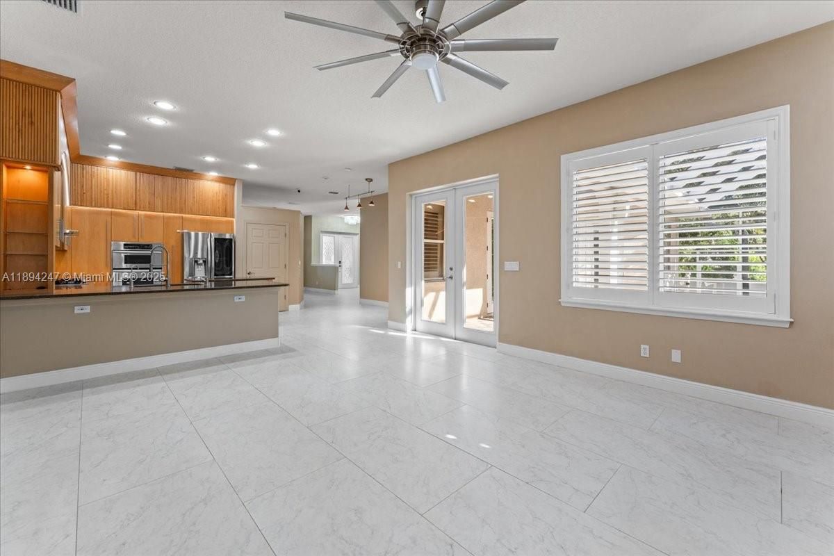 Empty room, Interior, Kitchen, Marble, Pendant Lights, Recessed Lighting, Stainless Steel Appliances
