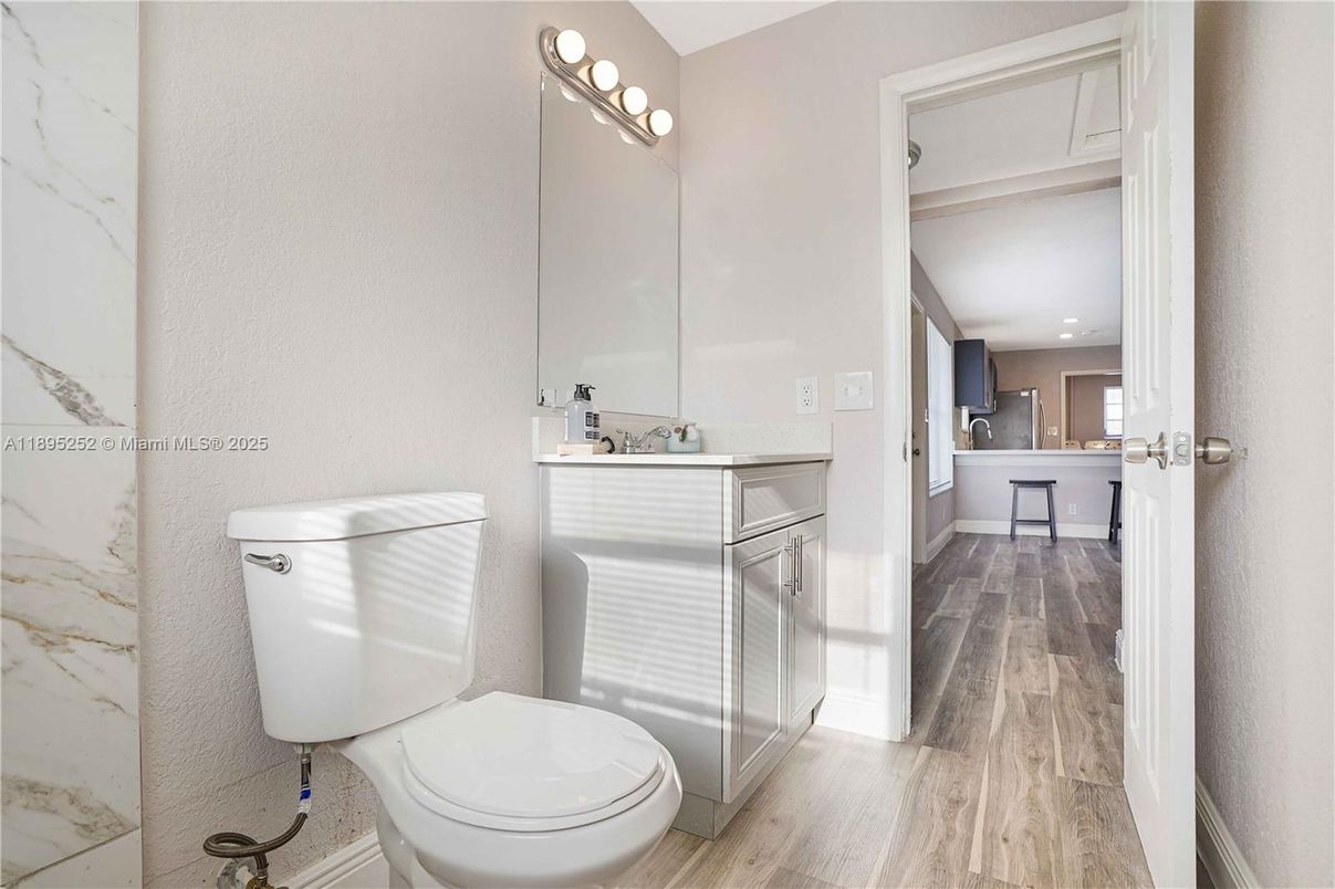 Bathroom, Interior, Marble Walls, Recessed Lighting, Wood Texture Flooring