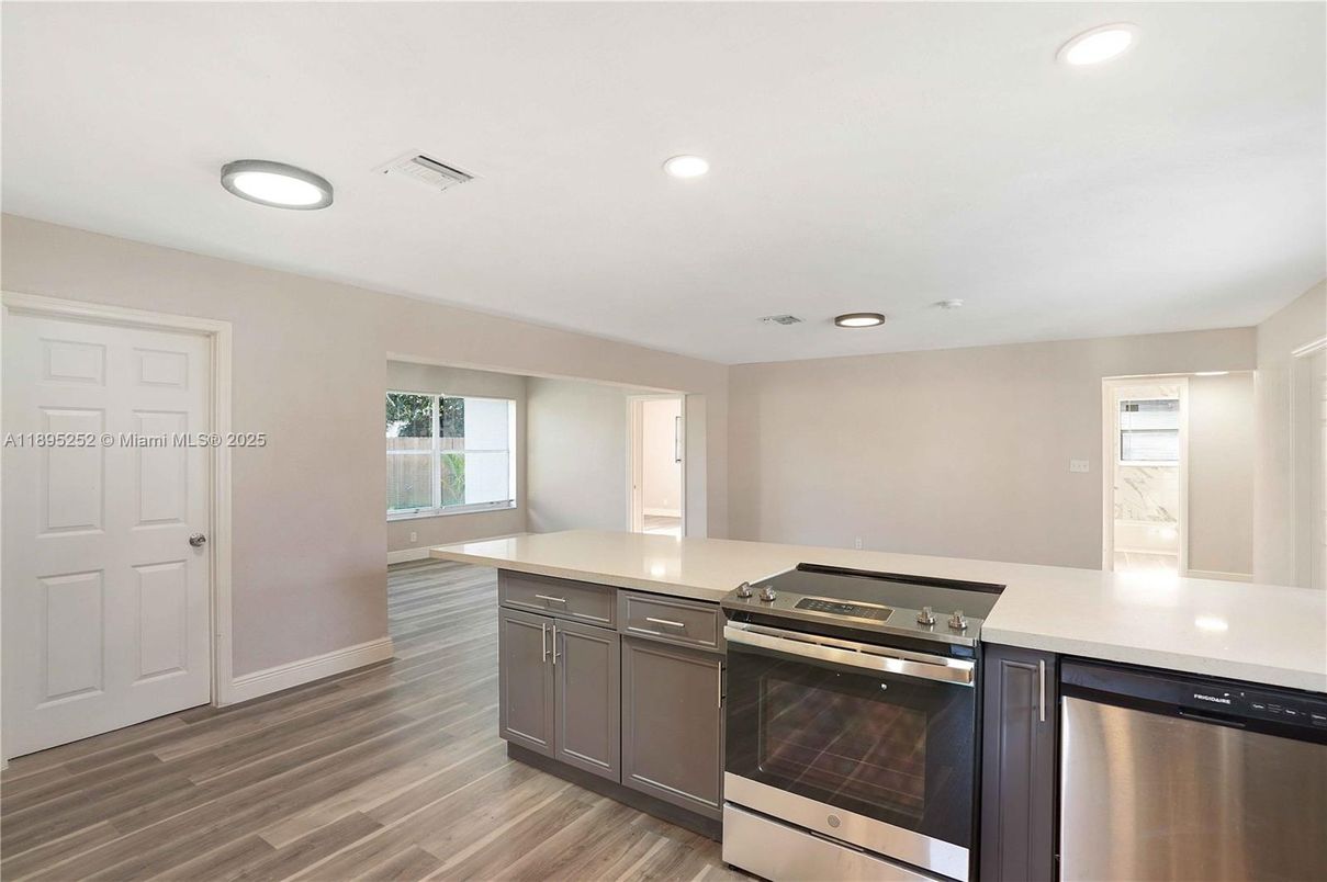 Interior, Kitchen, Recessed Lighting, Stainless Steel Appliances, Wood Texture Flooring