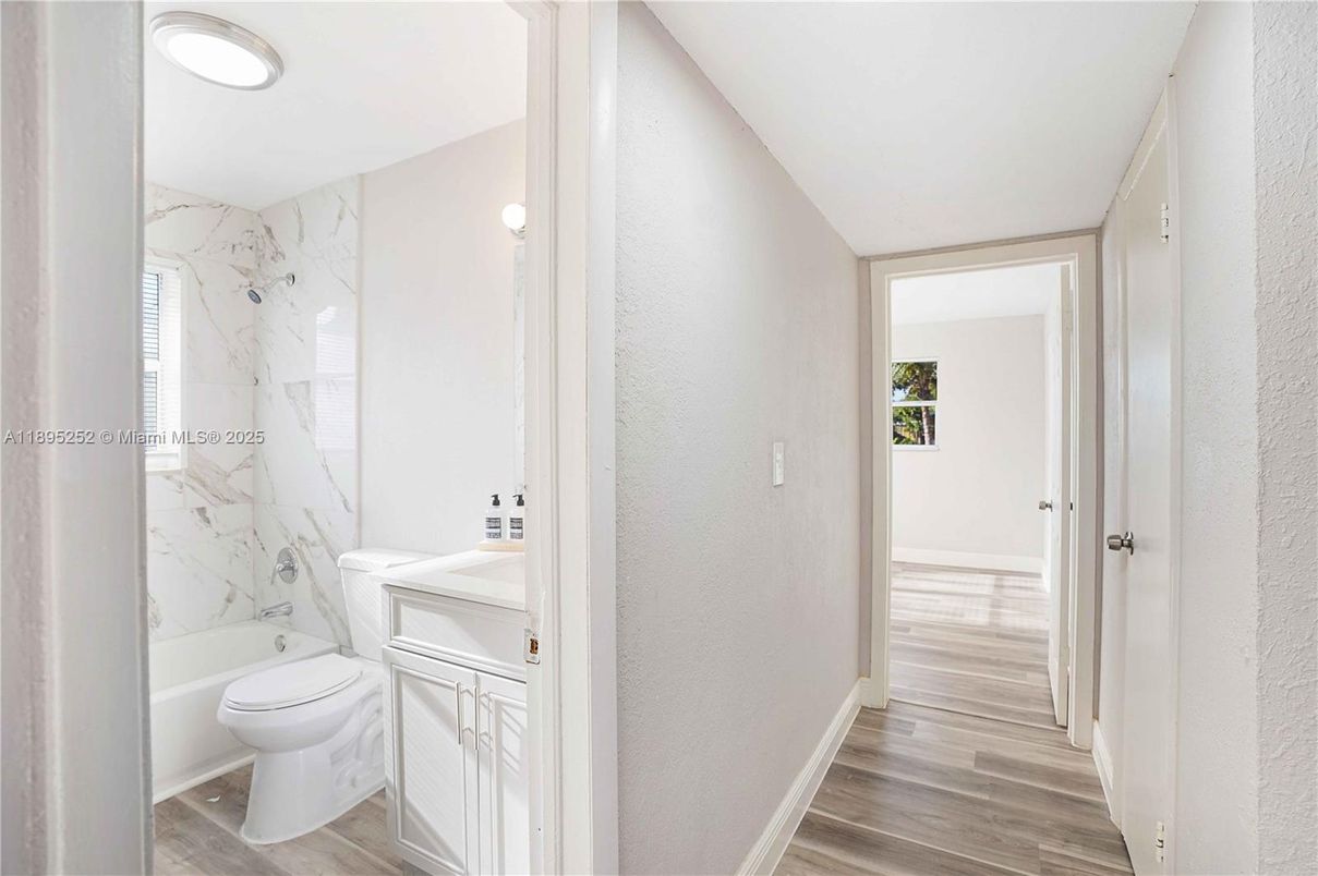 Bathroom, Interior, Marble Walls, Recessed Lighting, Wood Texture Flooring