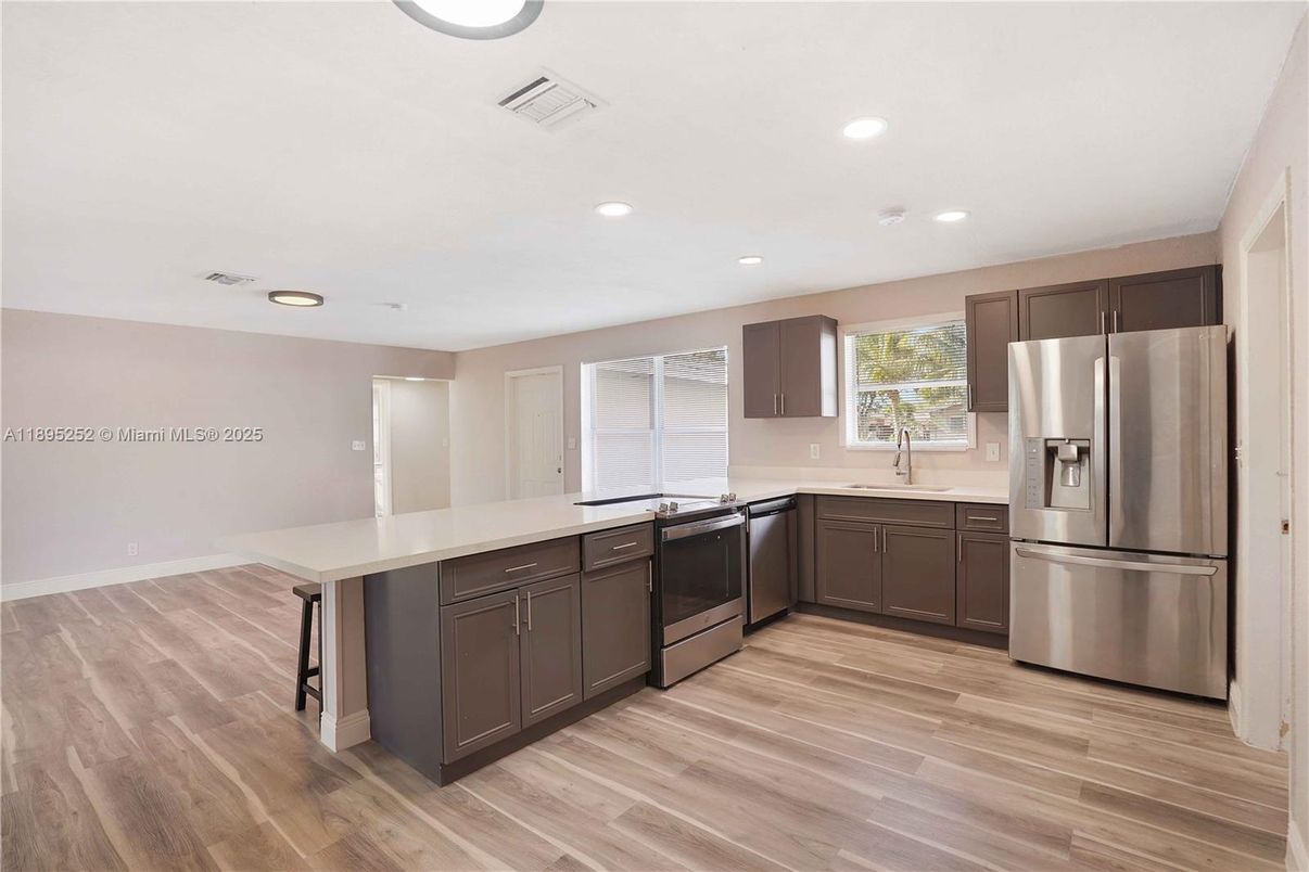 Interior, Kitchen, Recessed Lighting, Stainless Steel Appliances, Wood Texture Flooring