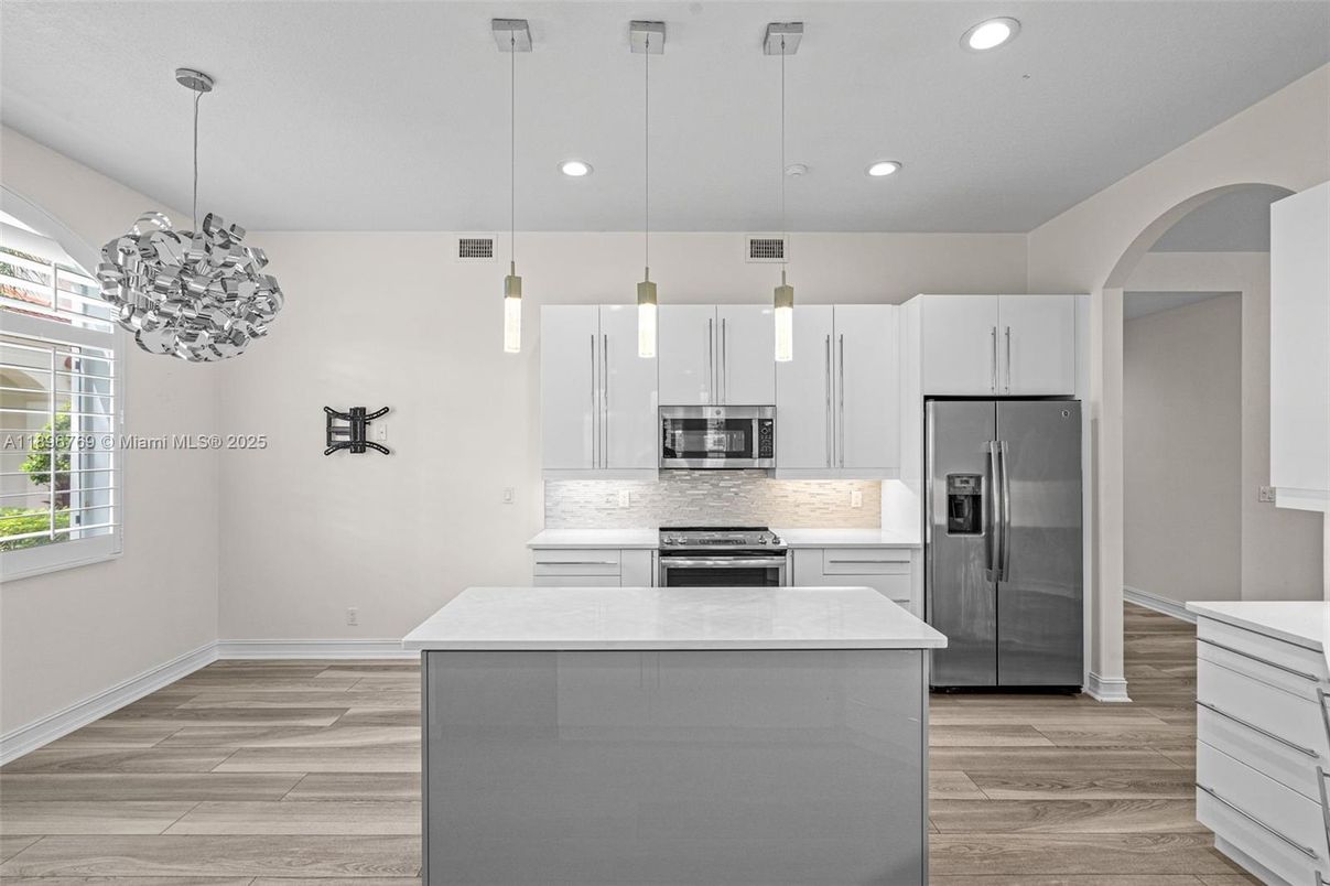 Interior, Kitchen, Pendant Lights, Recessed Lighting, Stainless Steel Appliances, Wood Texture Flooring