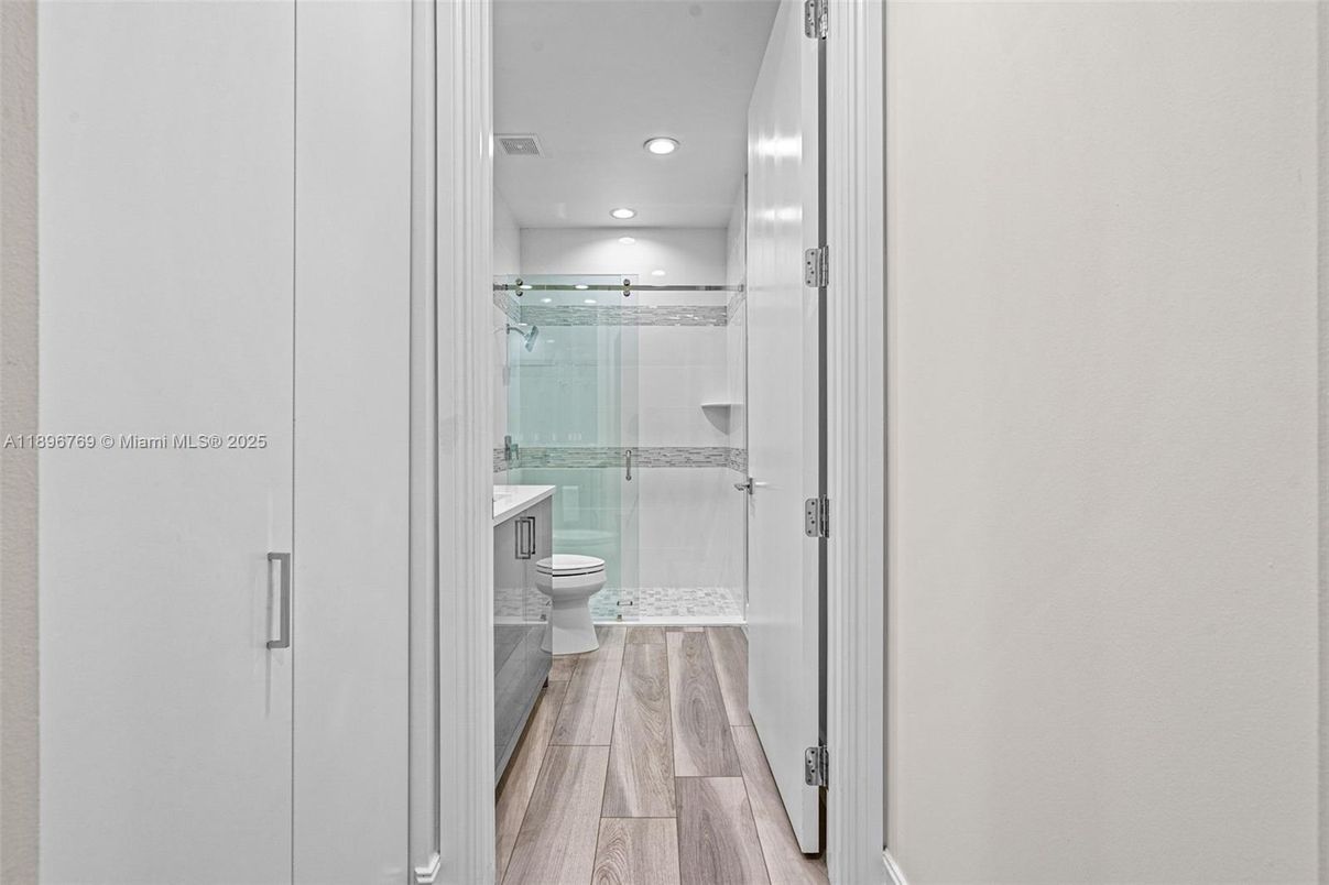 Bathroom, Glass Shower, Interior, Recessed Lighting, Wood Texture Flooring