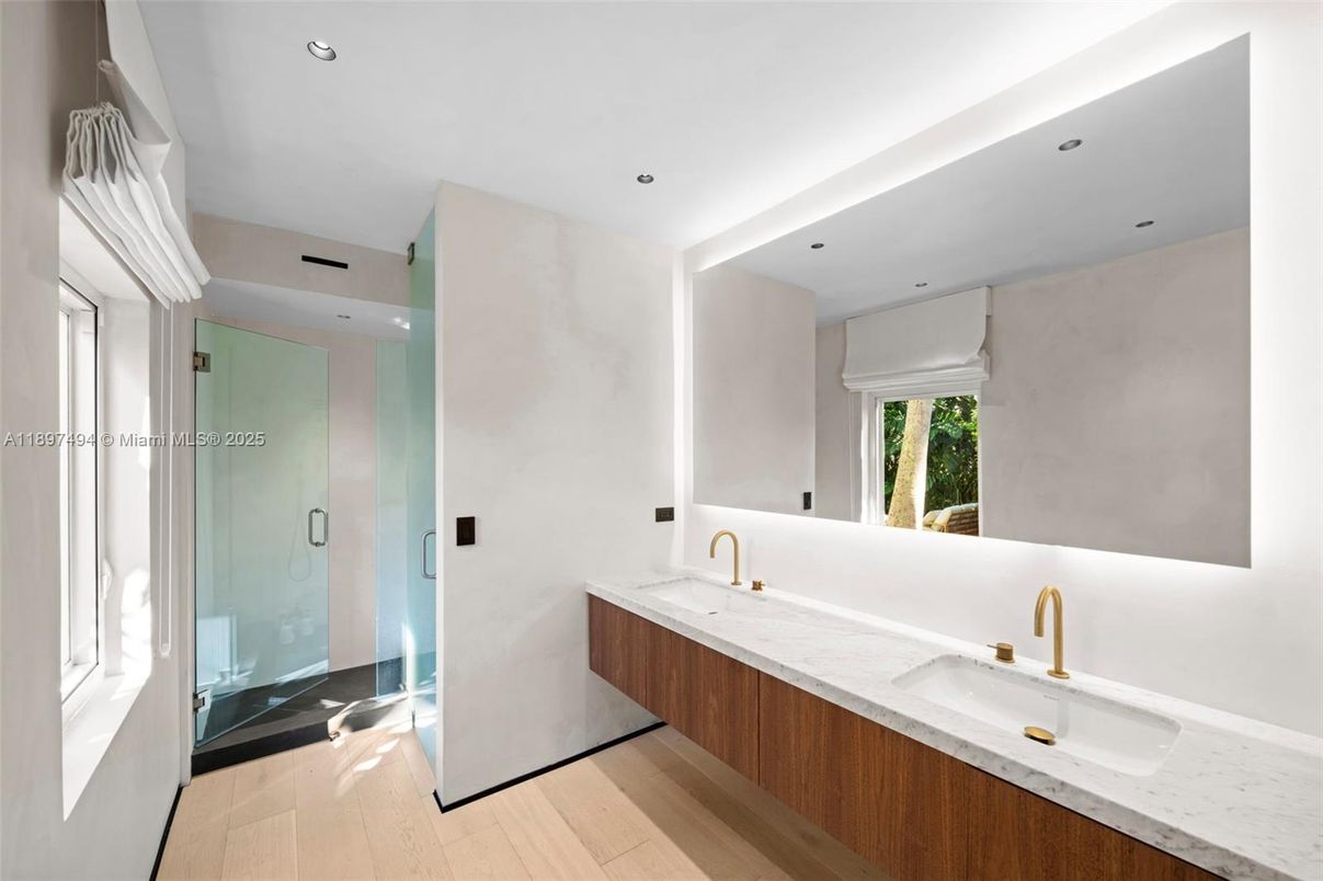 Bathroom, Dual Sink Vanities, Glass Shower, Interior, Recessed Lighting, Wood Texture Flooring