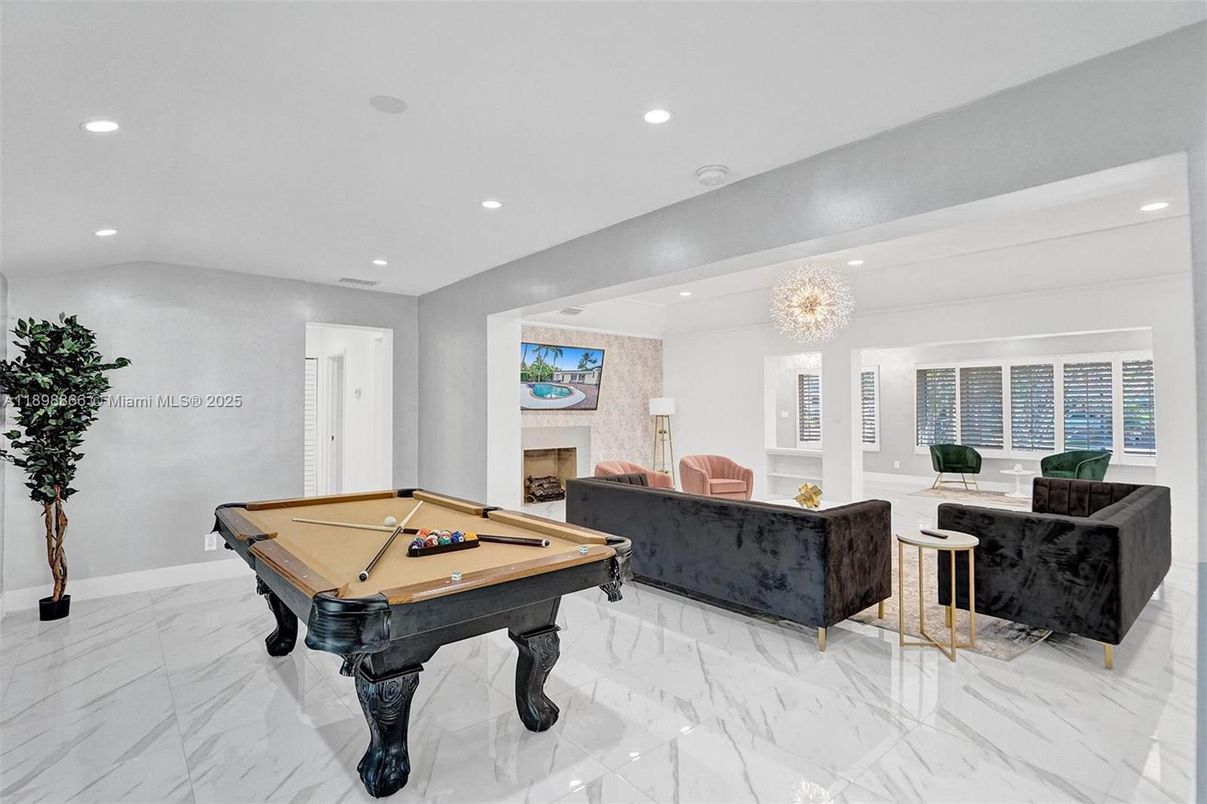 Billiard Table, Chandelier, Fireplace, Game Room, Interior, Living room, Marble, Recessed Lighting
