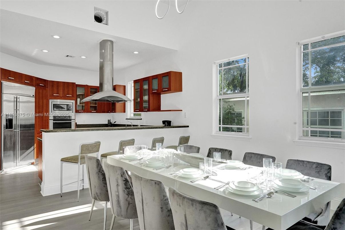 Dining room, Interior, Kitchen, Recessed Lighting, Stainless Steel Appliances, Wood Texture Flooring