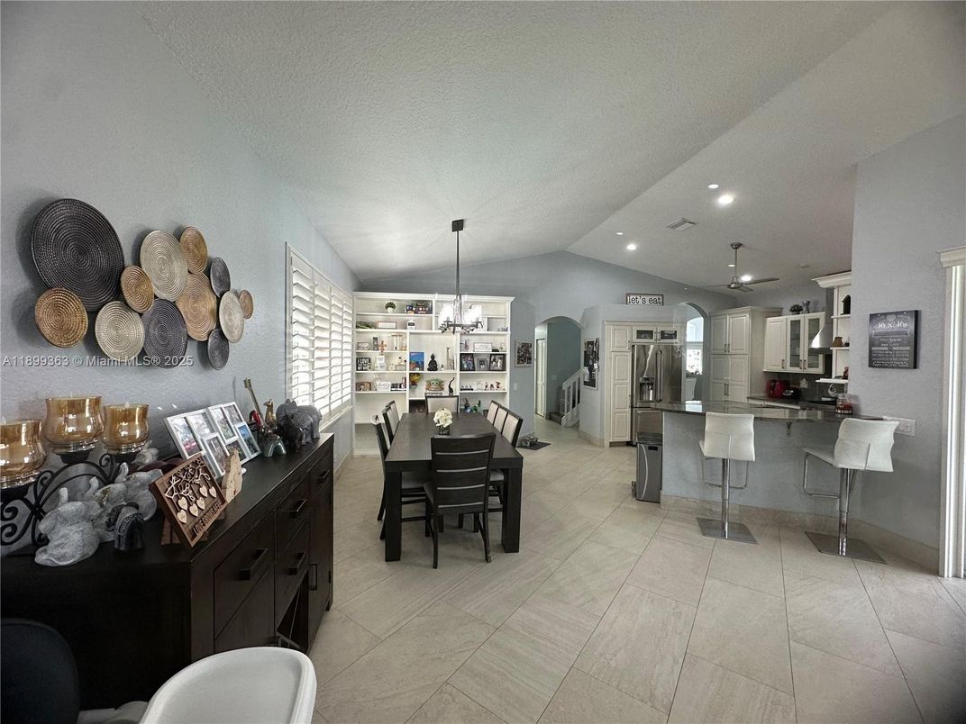 Chandelier, Dining room, Interior, Kitchen, Pendant Lights, Recessed Lighting, Stainless Steel Appliances