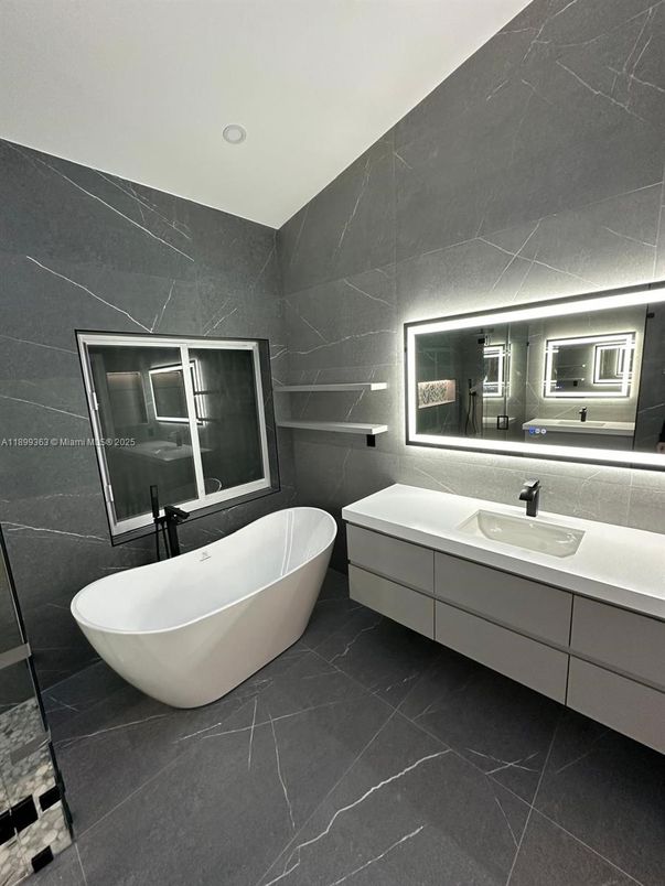 Bathroom, Dual Sink Vanities, Free Standing Baths, Interior, Marble Walls, Recessed Lighting