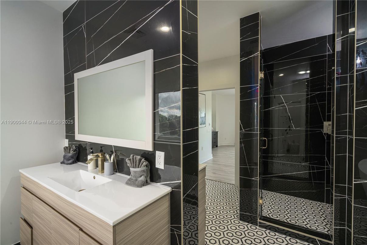 Bathroom, Dual Sink Vanities, Interior, Recessed Lighting, Wood Texture Flooring