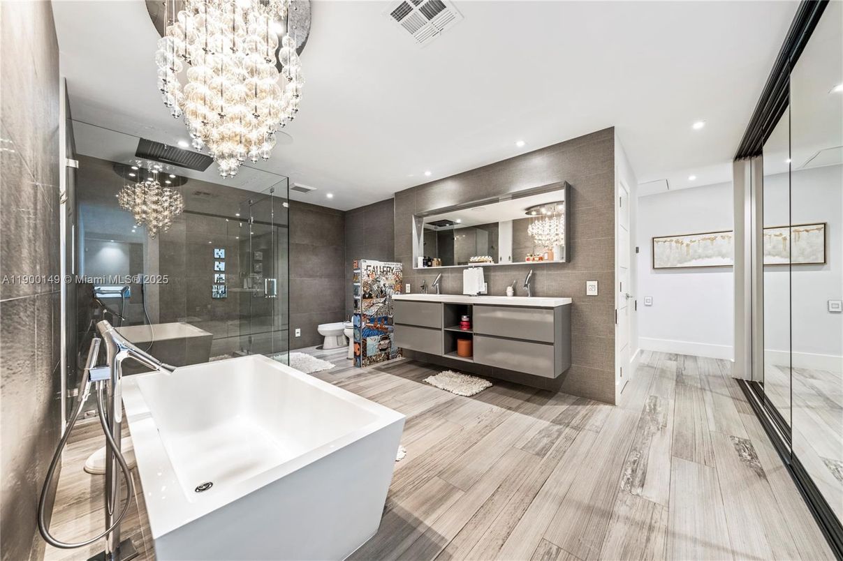 Bathroom, Chandelier, Free Standing Baths, Glass Shower, Interior, Recessed Lighting, Wood Texture Flooring