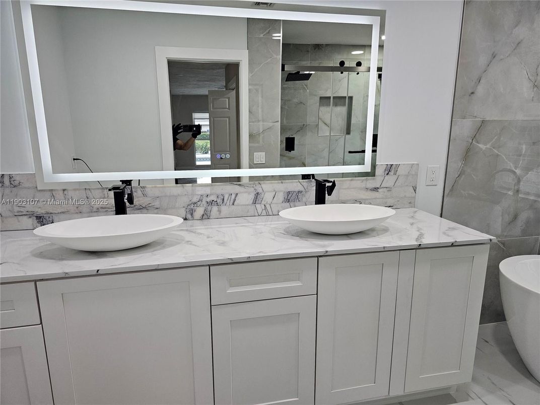 Bathroom, Dual Sink Vanities, Free Standing Baths, Interior, Marble, Marble Walls