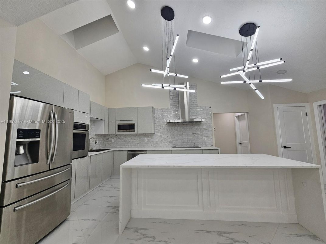 Interior, Kitchen, Marble, Pendant Lights, Recessed Lighting, Stainless Steel Appliances