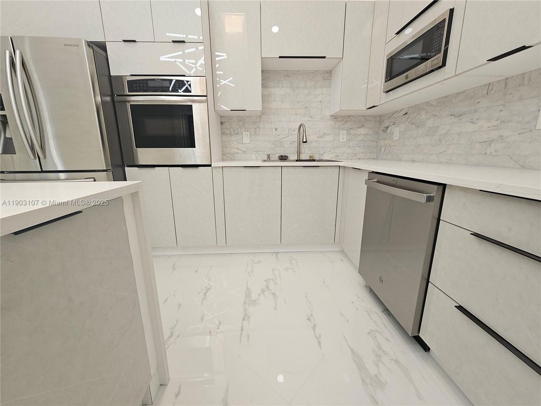 Interior, Kitchen, Marble, Marble Walls, Stainless Steel Appliances