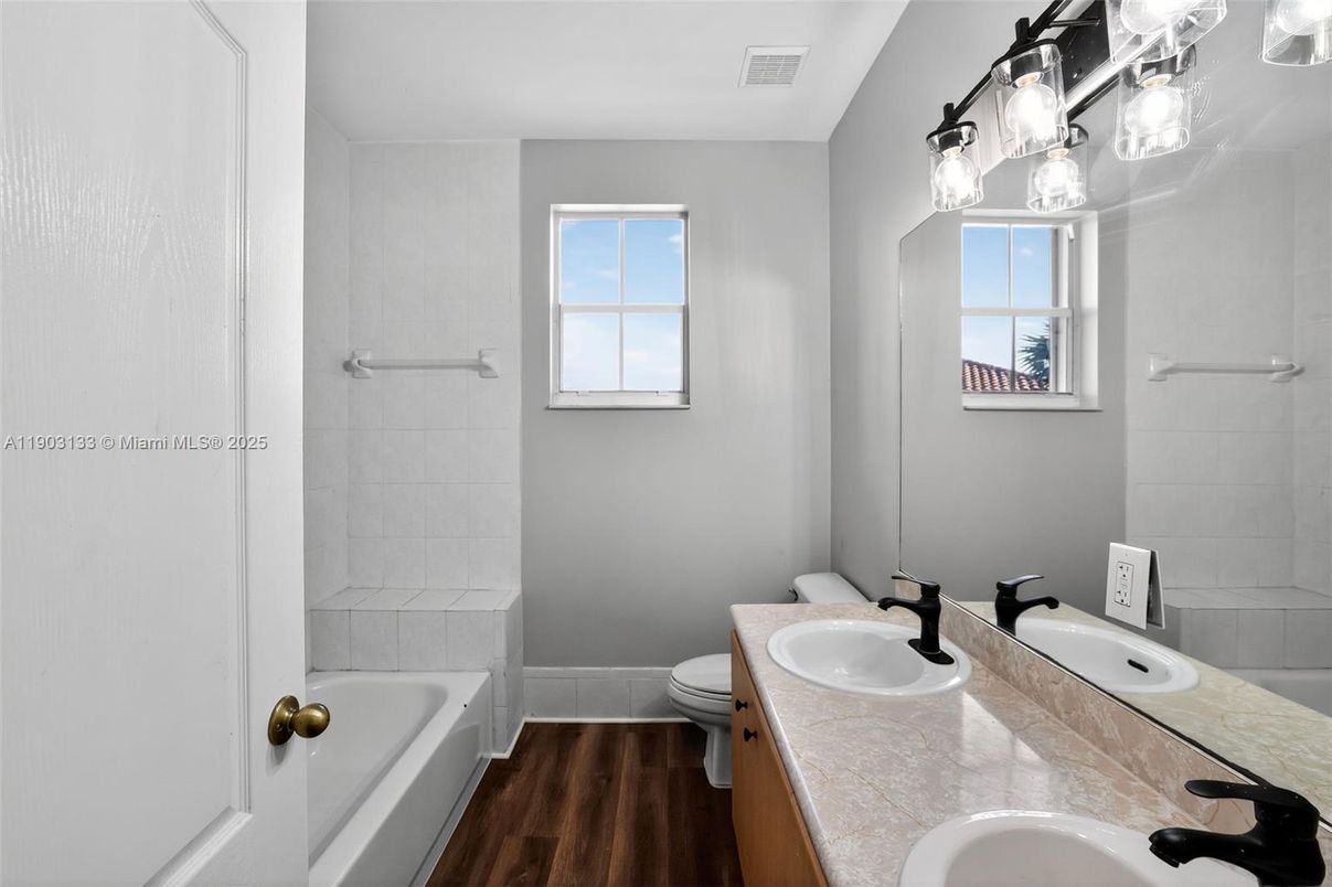 Bathroom, Dual Sink Vanities, Interior, Tile Countertops, Wood Texture Flooring