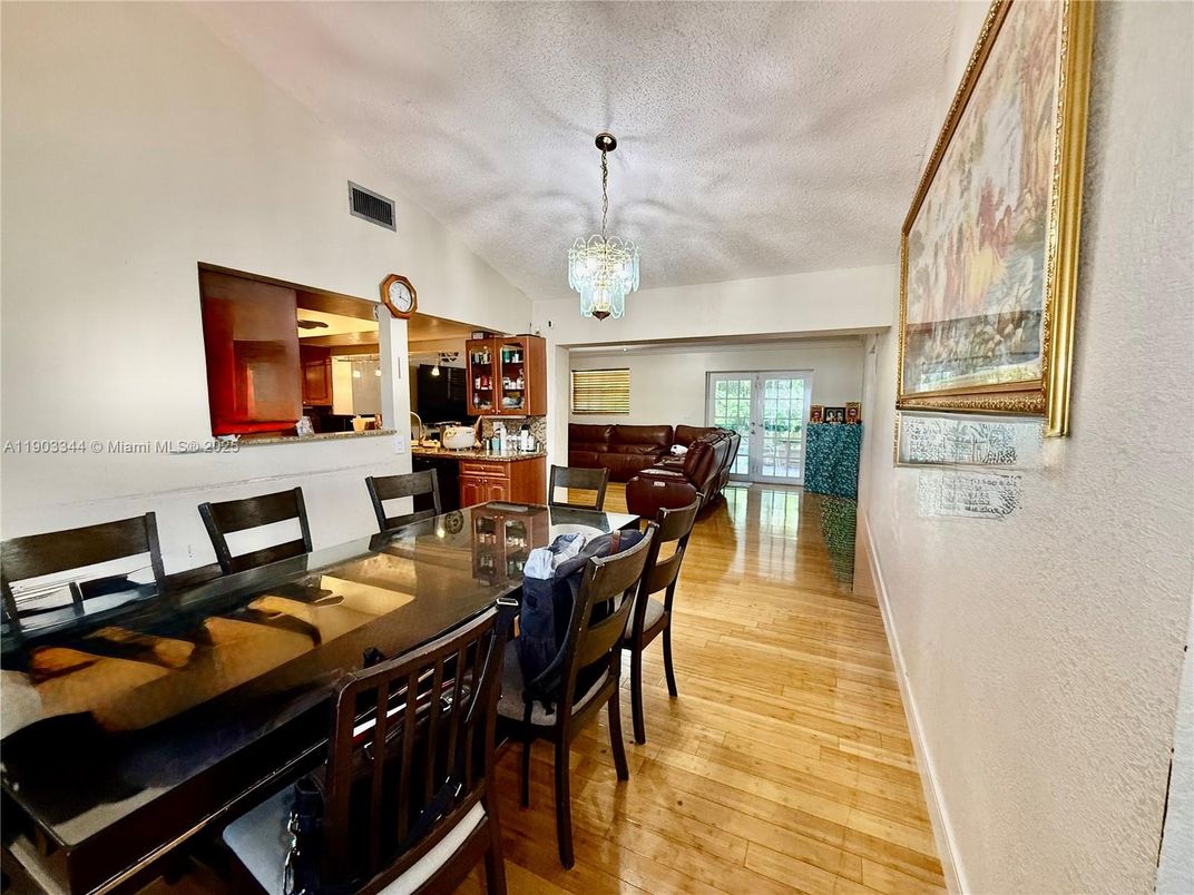 Chandelier, Dining room, Fireplace, Interior, Living room, Wood Texture Flooring