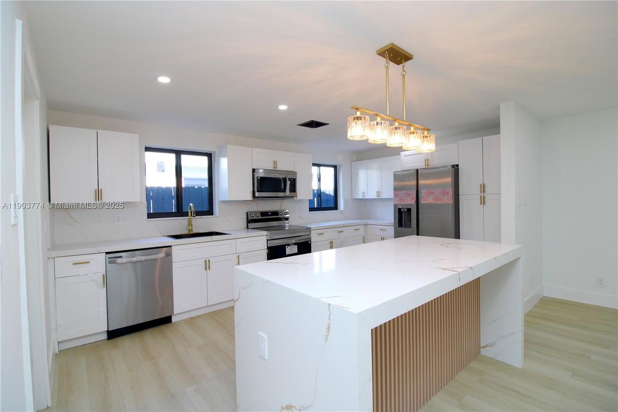 Interior, Kitchen, Pendant Lights, Recessed Lighting, Stainless Steel Appliances, Wood Texture Flooring