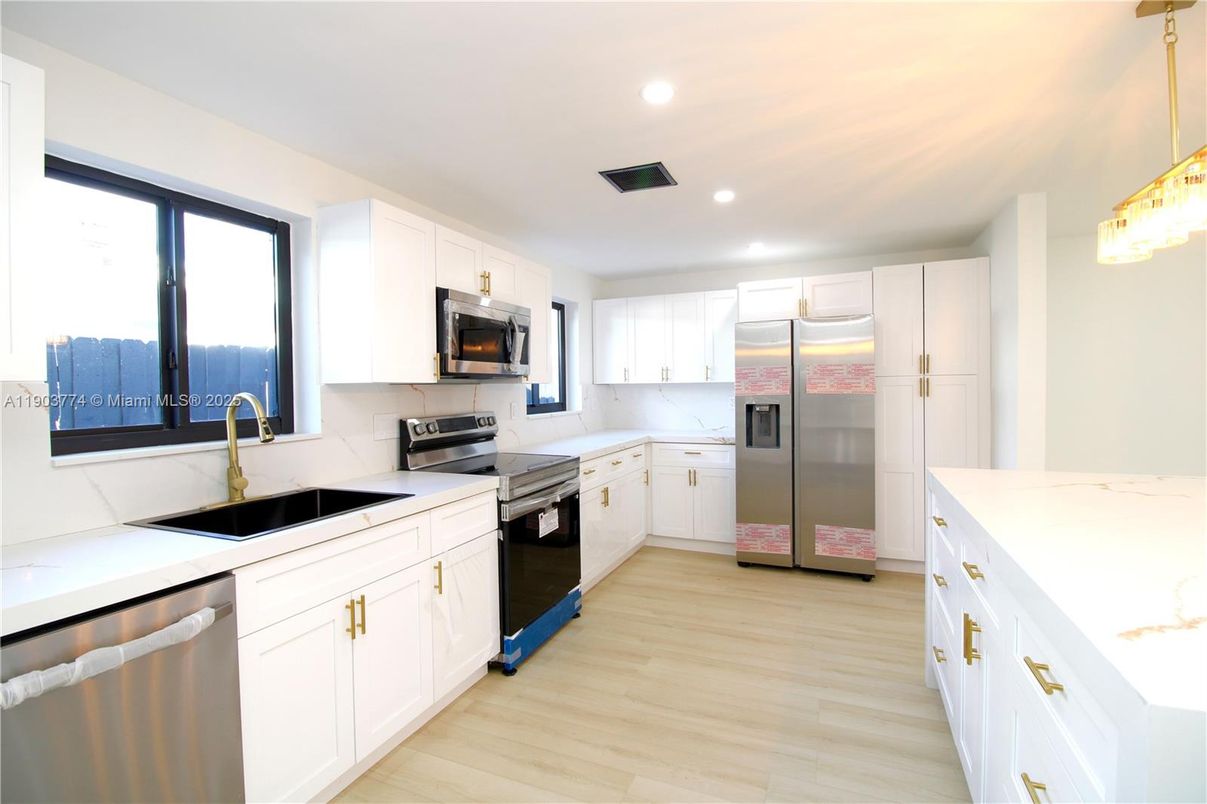 Interior, Kitchen, Recessed Lighting, Stainless Steel Appliances, Wood Texture Flooring