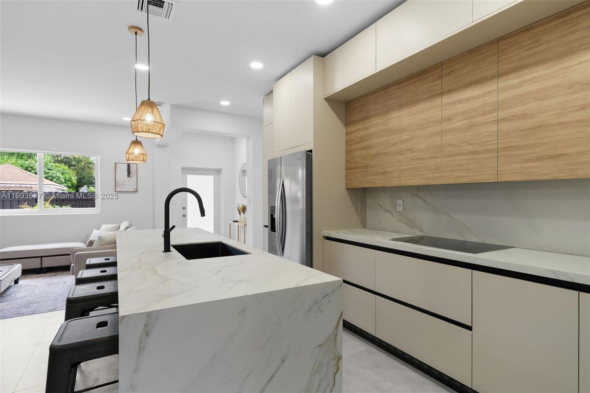 Interior, Kitchen, Marble Walls, Pendant Lights, Recessed Lighting, Stainless Steel Appliances