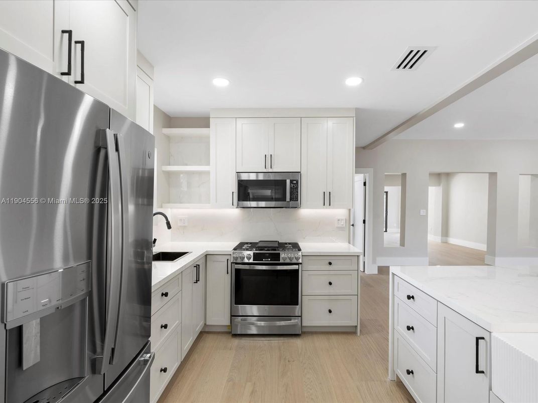 Interior, Kitchen, Recessed Lighting, Stainless Steel Appliances, Wood Texture Flooring