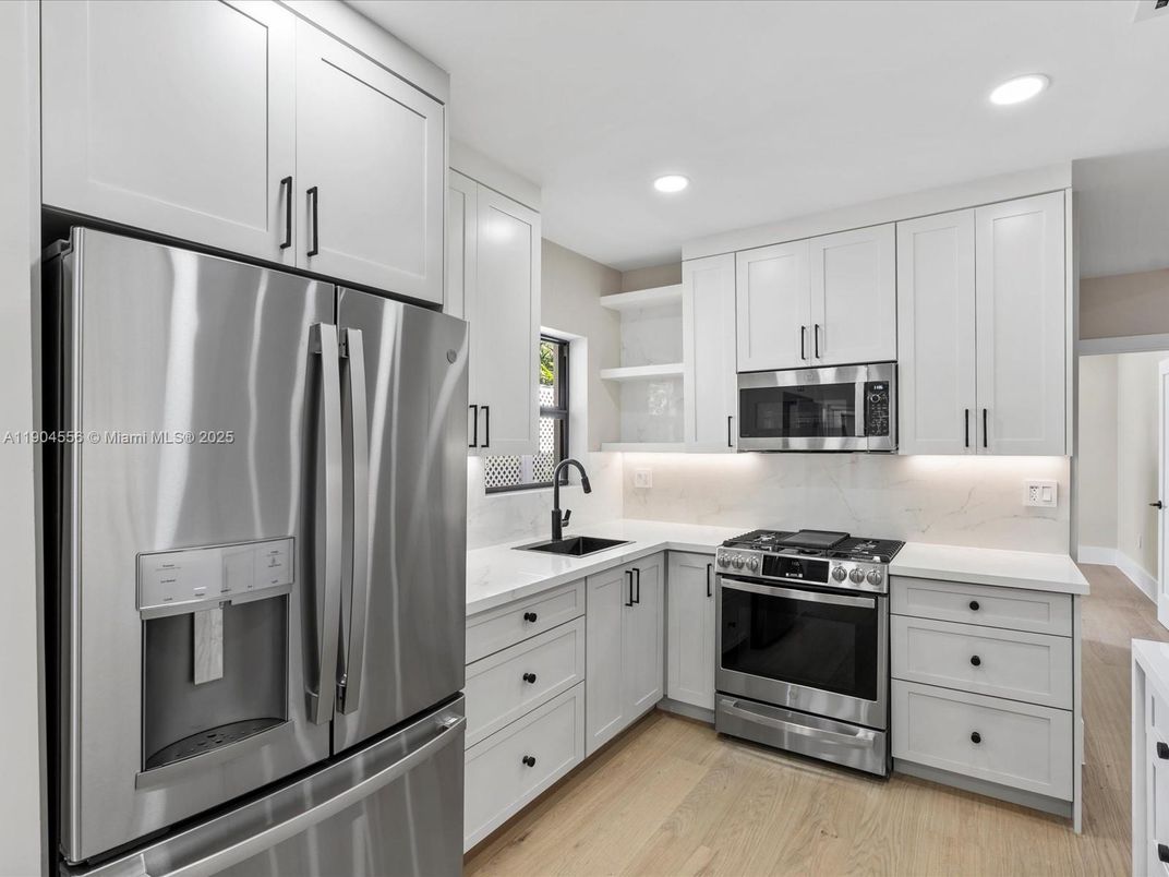 Interior, Kitchen, Recessed Lighting, Stainless Steel Appliances, Wood Texture Flooring