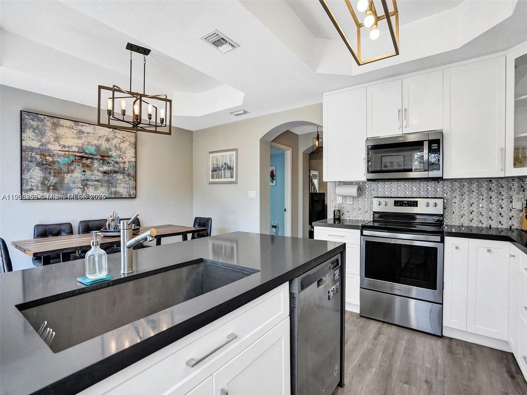 Interior, Kitchen, Pendant Lights, Stainless Steel Appliances, Wood Texture Flooring