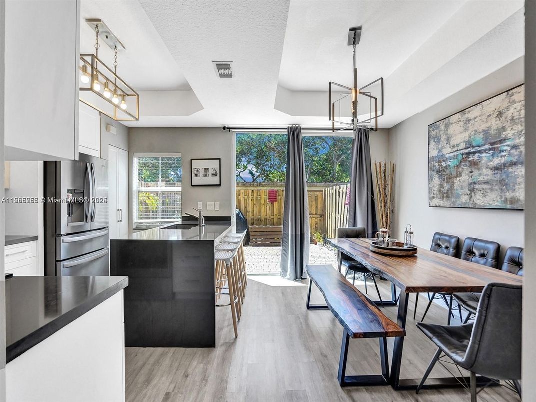Dining room, Interior, Kitchen, Pendant Lights, Stainless Steel Appliances, Wood Texture Flooring