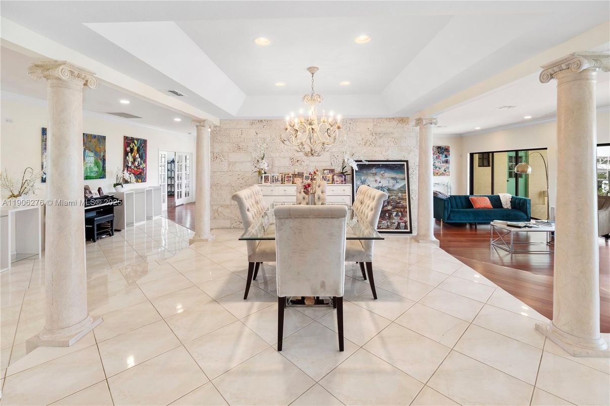 Chandelier, Dining room, Fireplace, Interior, Living room, Recessed Lighting, Stone Walls, Wood Texture Flooring