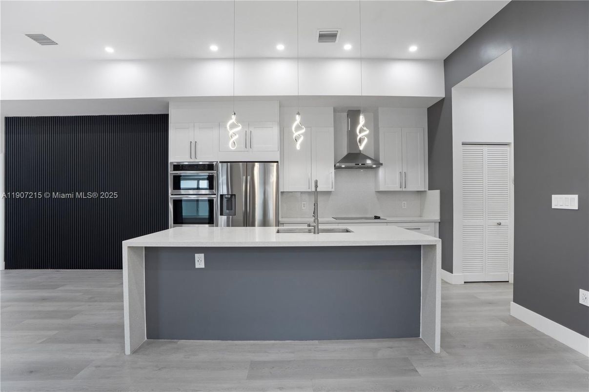 Interior, Kitchen, Pendant Lights, Recessed Lighting, Stainless Steel Appliances, Wood Texture Flooring