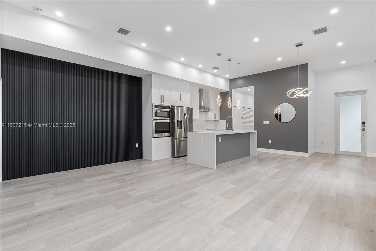 Interior, Kitchen, Pendant Lights, Recessed Lighting, Stainless Steel Appliances, Wood Texture Flooring