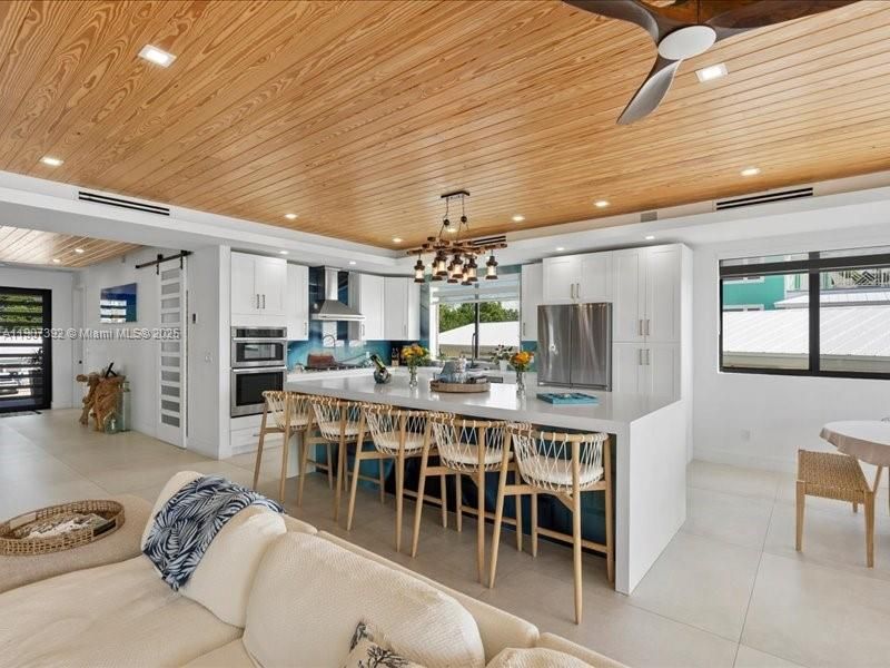 Dining room, Interior, Kitchen, Living room, Pendant Lights, Recessed Lighting, Stainless Steel Appliances, Wooden Ceilings