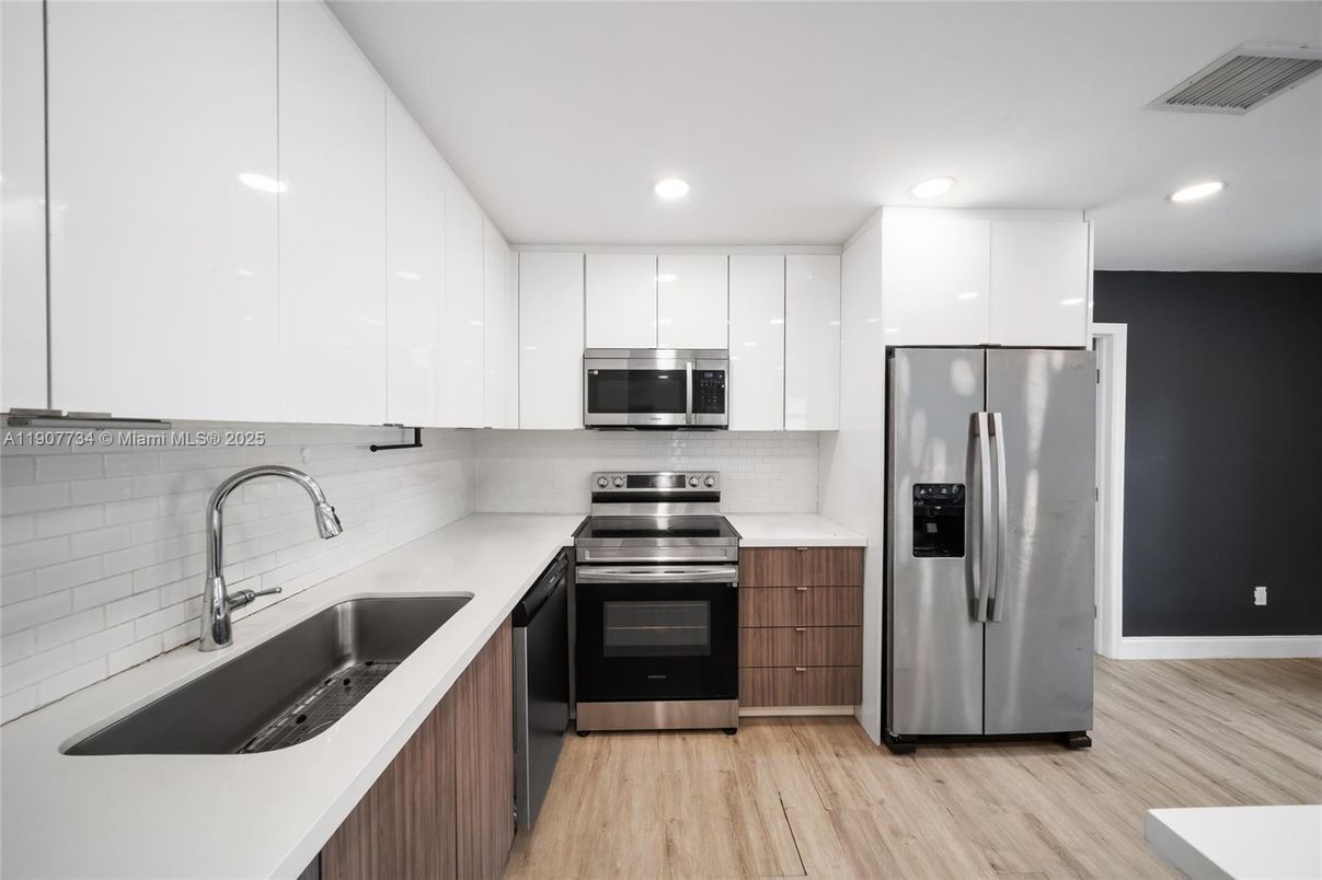 Interior, Kitchen, Recessed Lighting, Stainless Steel Appliances, Wood Texture Flooring