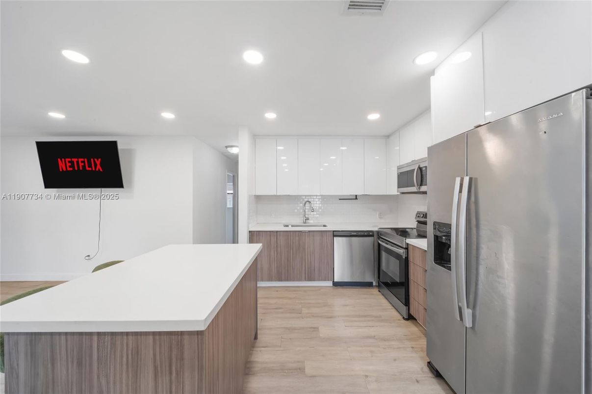 Interior, Kitchen, Recessed Lighting, Stainless Steel Appliances, Wood Texture Flooring