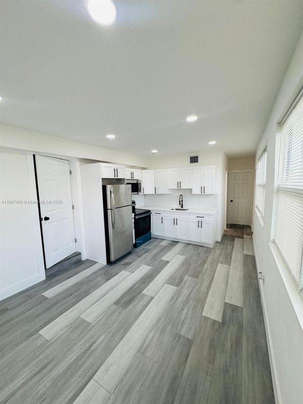 Interior, Kitchen, Recessed Lighting, Stainless Steel Appliances, Wood Texture Flooring
