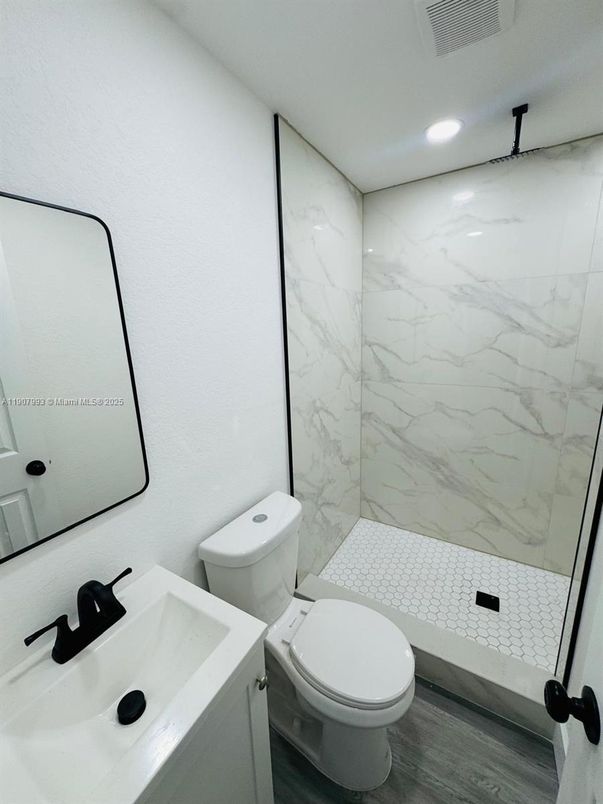 Bathroom, Interior, Marble Walls, Recessed Lighting, Wood Texture Flooring