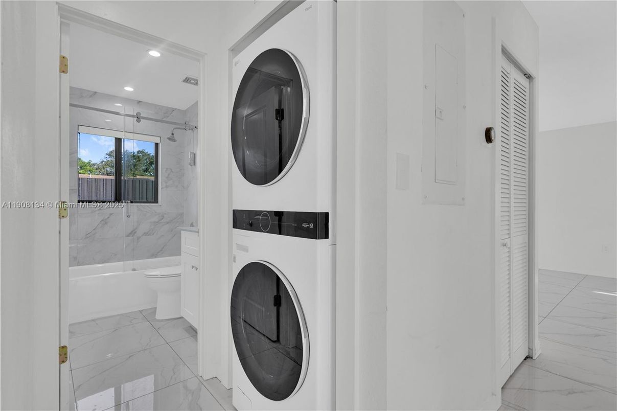 Bathroom, Interior, Marble, Marble Walls, Recessed Lighting, Utility Closets, Washer