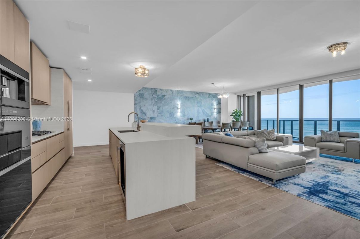 Interior, Kitchen, Living room, Marble Walls, Pendant Lights, Recessed Lighting, Water, Wood Texture Flooring