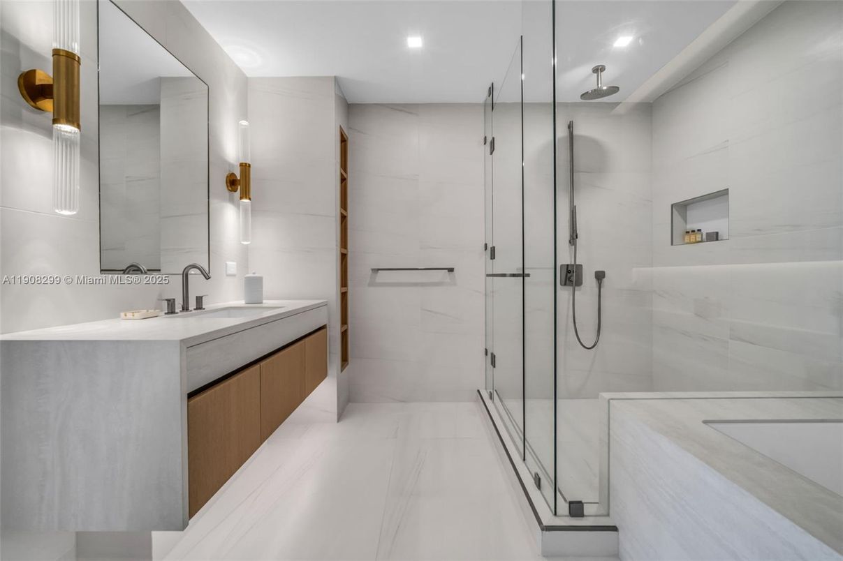 Bathroom, Dual Sink Vanities, Glass Shower, Interior, Marble, Marble Walls, Recessed Lighting
