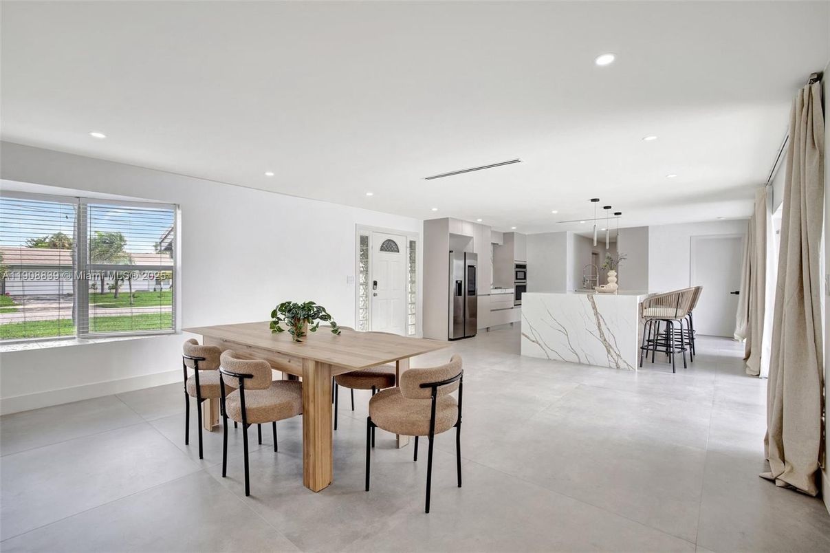 Dining room, Interior, Kitchen, Marble Walls, Pendant Lights, Recessed Lighting, Stainless Steel Appliances