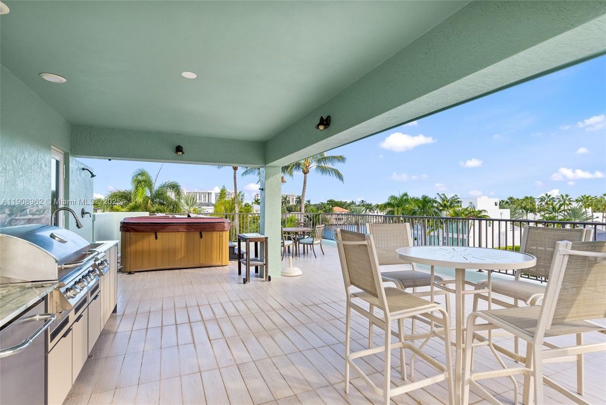 Exterior, Hot Tub, Outdoor Kitchen