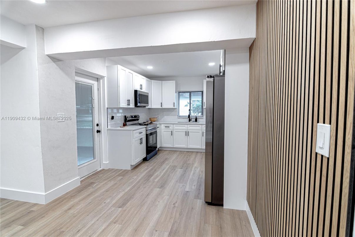 Interior, Kitchen, Recessed Lighting, Stainless Steel Appliances, Wood Texture Flooring