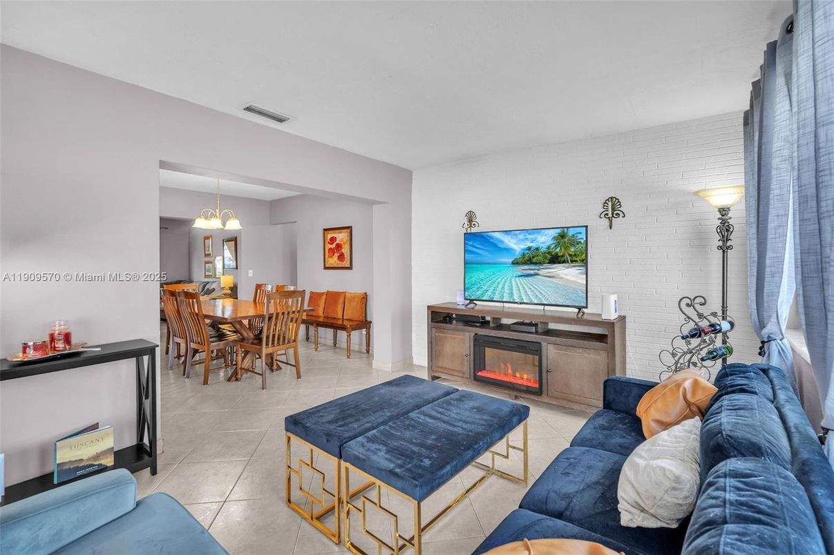 Chandelier, Dining room, Fireplace, Interior, Living room