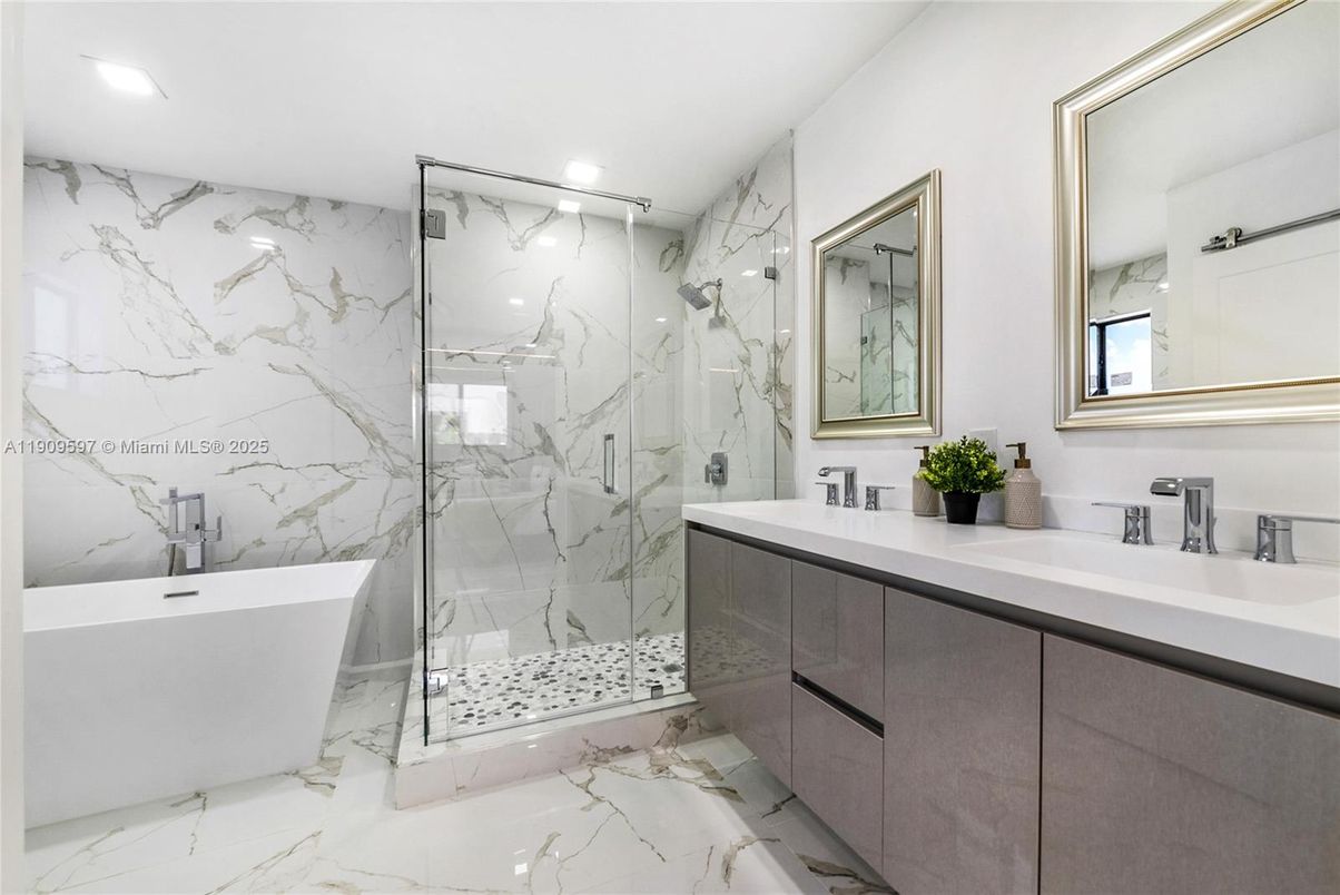 Bathroom, Dual Sink Vanities, Free Standing Baths, Glass Shower, Interior, Marble, Marble Walls, Recessed Lighting