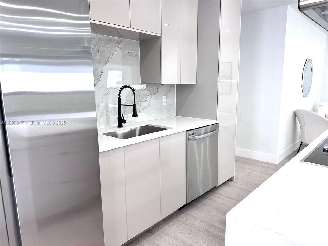 Interior, Kitchen, Marble Walls, Stainless Steel Appliances, Wood Texture Flooring