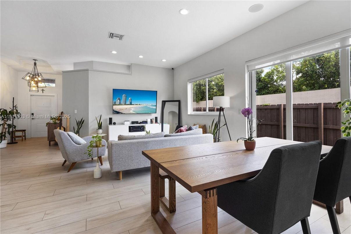 Dining room, Fireplace, Interior, Living room, Pendant Lights, Recessed Lighting, Wood Texture Flooring