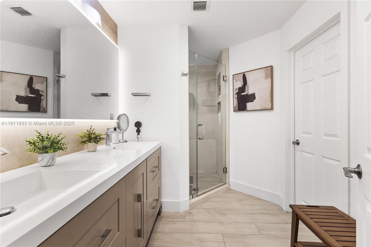 Bathroom, Dual Sink Vanities, Glass Shower, Interior, Wood Texture Flooring