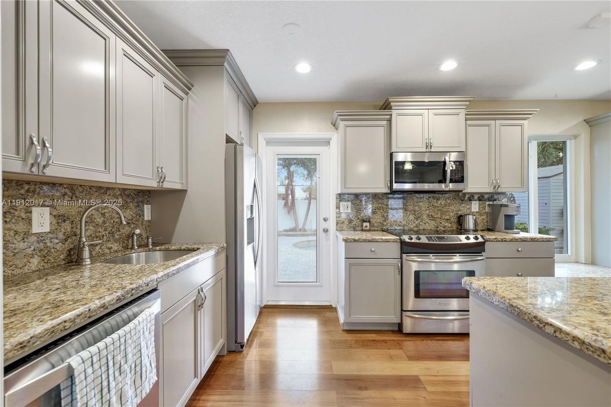 Interior, Kitchen, Recessed Lighting, Stainless Steel Appliances, Wood Texture Flooring