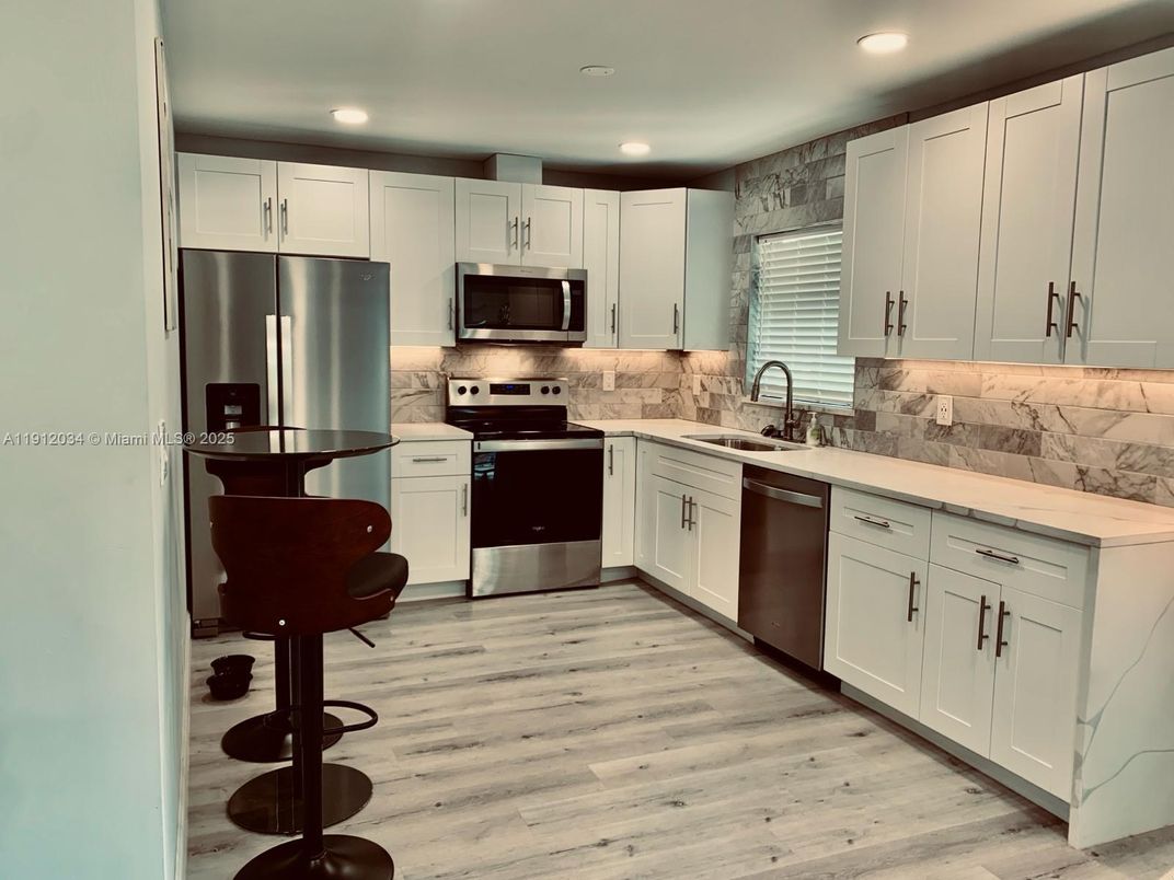 Interior, Kitchen, Recessed Lighting, Stainless Steel Appliances, Wood Texture Flooring